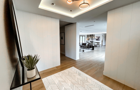 hallway remodel with hidden doorways and built-in tile rug